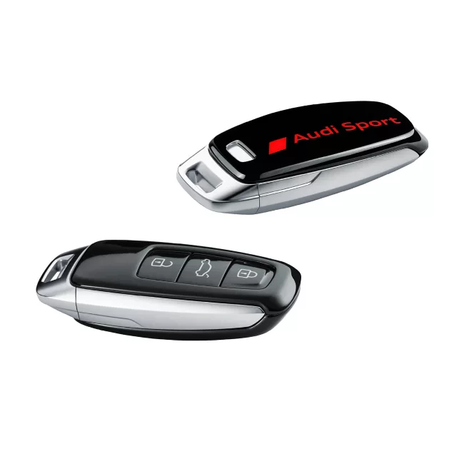 Original Audi Schlüsselblende mythosschwarz mit Audi Sport Schriftzug rot metallic Original Audi Schlüsselblende mythosschwarz mit Audi Sport Schriftzug rot metallic